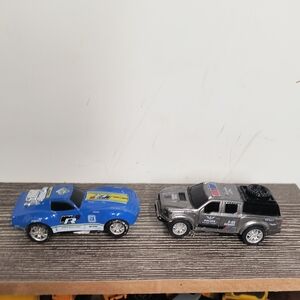 Blue and Silver Toy Car Set Slot Cars